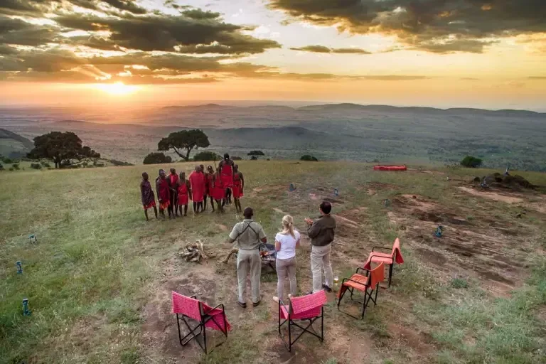 maasai-warriors-on-the-edge-of-ngorongoro-crater-in-tanzania-on-a-andbeyond-safari_1-1