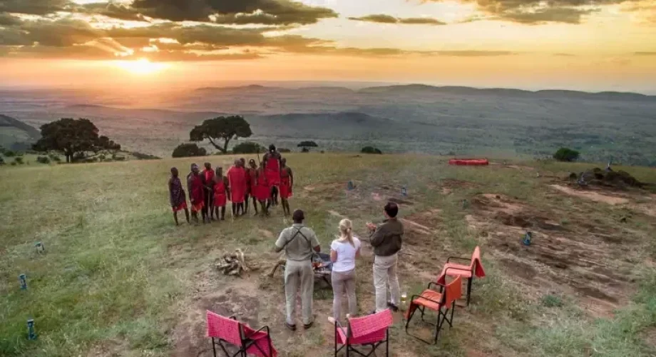 maasai-warriors-on-the-edge-of-ngorongoro-crater-in-tanzania-on-a-andbeyond-safari_1-1